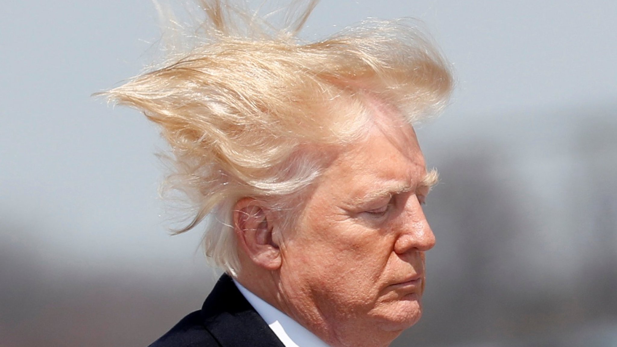Donald Trump with hair blowing in wind